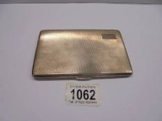 A silver cigarette case, 178 grams.