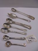 Seven assorted silver spoons, 124 grams.