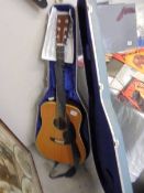 A Martin acoustic guitar, serial no. 332229, 1973 with genuine hard case and accessories,