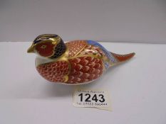 A Royal Crown Derby tortoise paperweight with silver stopper.