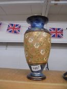 A Doulton stoneware vase.