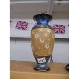 A Doulton stoneware vase.
