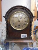 An oak cased W G Benson London mantel clock.