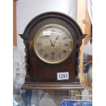 An oak cased W G Benson London mantel clock.