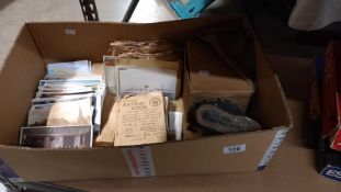 A quantity of 1940's ephemera including postcards, letters, gas masks etc