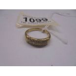 A gold ring size O half, 3 grams.