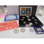 A boxed set of pre-decimal coins and other coins.