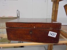 A Victorian mahogany writing box.