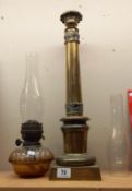 A Victorian brass oil lamp column, cut glass drop in font & 2 chimneys