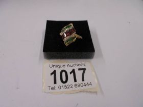 A yellow gold diamond, ruby and emerald ring, size R Half, 2.7 grams.