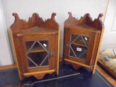 A pair of small corner cabinets COLLECT ONLY.