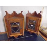 A pair of small corner cabinets COLLECT ONLY.