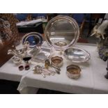 A mixed lot of silver plate including tray, wine coasters, flat ware etc.,