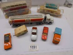 A quantity of vintage Majorette die cast cars, caravans, Esso tanker etc.,
