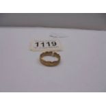 A unmarked ring (tests as 9ct) size p, 2.8 grams.