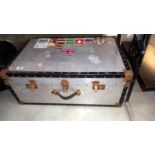 A Large vintage trunk with world travel stickers, COLLECT ONLY