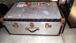 A Large vintage trunk with world travel stickers, COLLECT ONLY