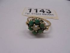 A vintage turquoise ring dated London 1959 in 9ct gold, size Q,