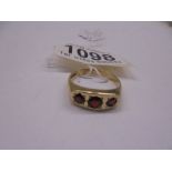 A gold ring set garnets, size T, 3.9 grams.