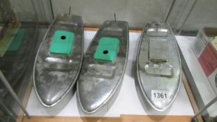 Three unpainted Sutcliffe tin plate model boats.