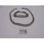 A heavy silver neck chain and a silver identity bracelet. 134 grams.