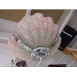 An art deco clam shell ceiling light.