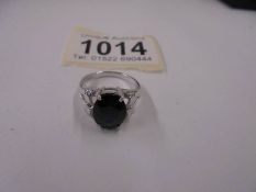 A large white gold amethyst ring, size N, 6.4 grams.
