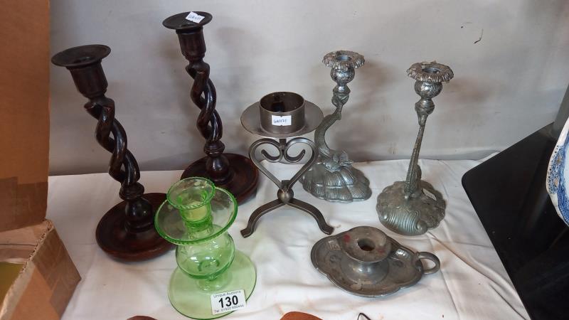 A pair of 1930's oak barley twist candlesticks, a pair of serpent candlesticks & 3 others