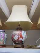 An oriental ceramic table lamp with shade. COLLECT ONLY.