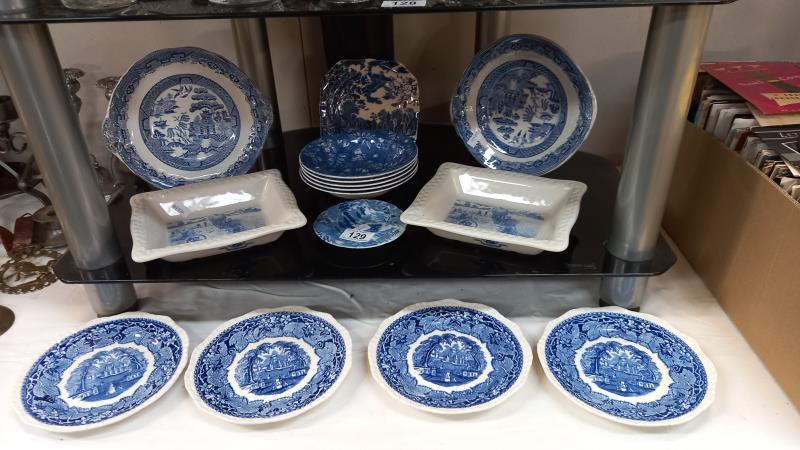 A quantity of blue & white dishes/plates including 2 Shredded Wheat dishes
