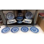 A quantity of blue & white dishes/plates including 2 Shredded Wheat dishes