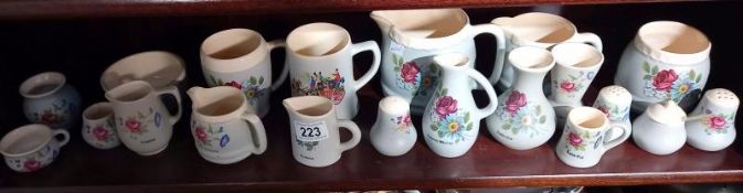 A large collection of Buckfast Devon Killburn Pottery jugs etc