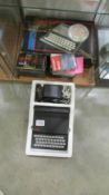 A vintage Sinclair ZX81 eith 16k ram and a quantity of games.