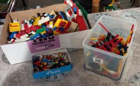 A box of old Lego including Minifigs and some Lego Technics in box