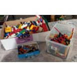 A box of old Lego including Minifigs and some Lego Technics in box