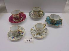 Five Limoges fine porcelain tea cups and saucers.