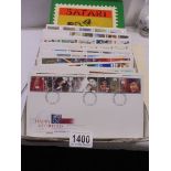 A Safari stamp album and a quantity of first day covers.