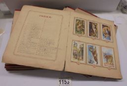 Thirteen Gallaher cigarette card books from 1930's, mostly full.