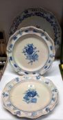 Three Delft style blue and white plates.