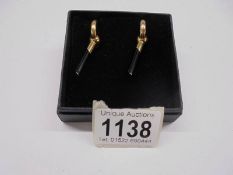 Unusual 9ct gold hoop earrings in a pendant design with onyx drop.