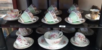 A quantity of cups & saucers & part tea set (2 shelves) COLLECT ONLY