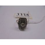 A 9ct gold and silver marcasite ring, size T.