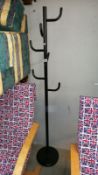 A metal free standing coat/hat stand, COLLECT ONLY