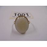 A yellow gold ring set large genuine opal, size Q, 2.6 grams.