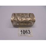 An embossed silver box featuring a Grecian scene. 56 grams.