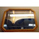 A pine framed mirror - 68cm x 52cm. COLLECT ONLY
