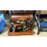 A vintage cased sewing machine COLLECT ONLY
