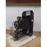 A Kodak Junior folding camera.