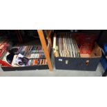 A box of LP records and a box of singles, cd's and cassettes COLLECT ONLY