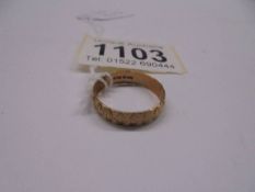 A gold wedding ring, size p, 1.9 grams.
